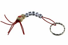 Gelukspoppetjes sleutelhanger poppetje met hartje op buik met naam